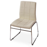 Silla Manhattan color crema con estructura cromada.