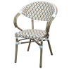 Sillón Are de rattan color arena y blanco.